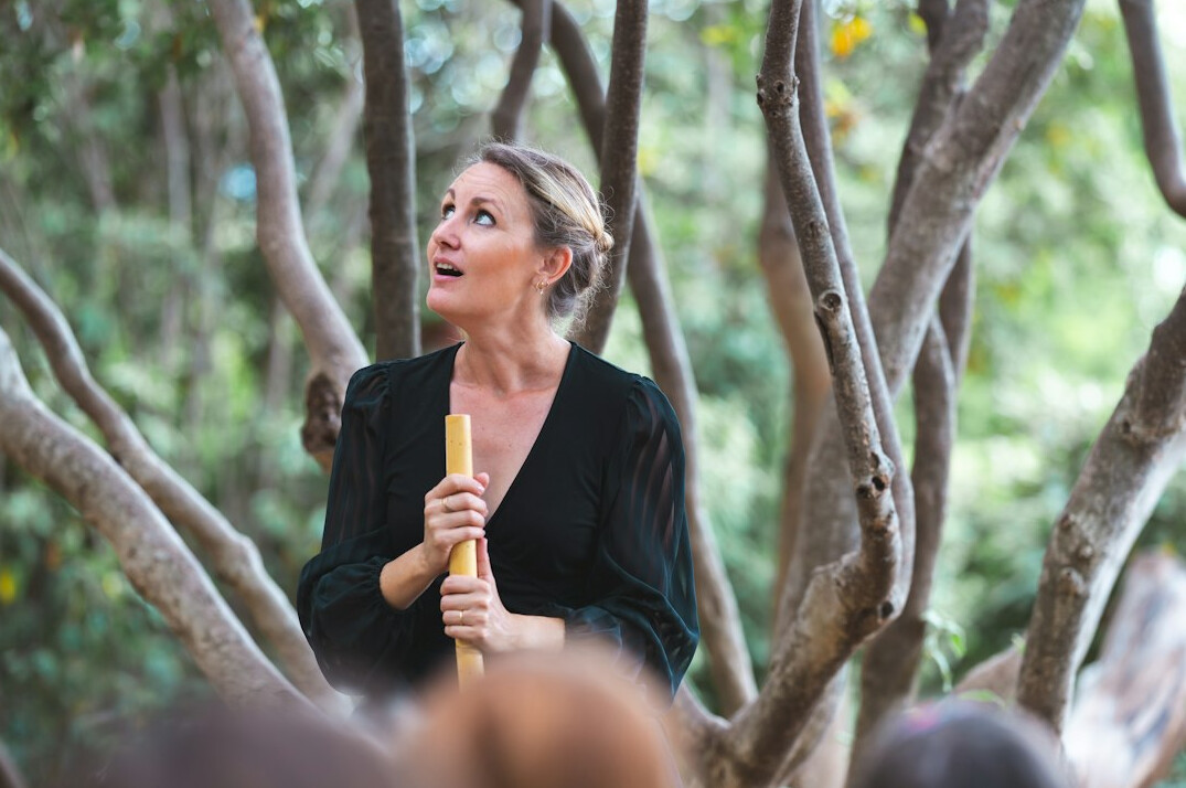 Woman presenting communication techniques to a small group